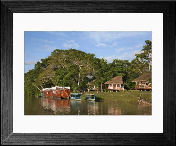 Framed Print : Peru. A tourist Lodge and two houseboats on the banks of the Madre de Dios River Framed Print : Peru. A tourist Lodge and two houseboats on the banks of the Madre de Dios River