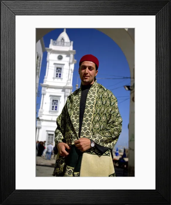 Framed Print : Libya, Tripolitania, Tripoli; A man in Libyan costume, during the Mawlid festivities celebrating Prophet Framed Print : Libya, Tripolitania, Tripoli; A man in Libyan costume, during the Mawlid festivities celebrating Prophet
