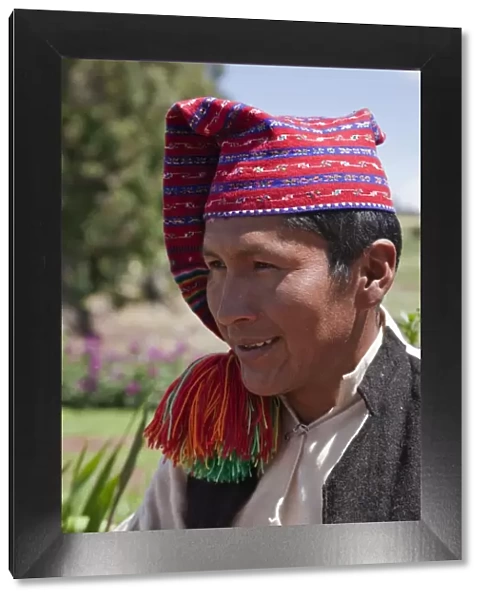 Peru, A Quechua-speaking man on Taquile Island wearing traditional dress