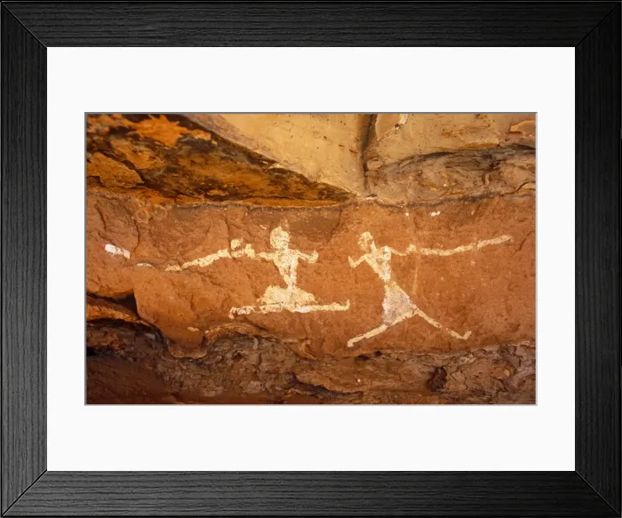 Framed Print : Libya, Fezzan, Jebel Akakus. A pair of running figures painted onto the walls of Uan Muhuggiag Framed Print : Libya, Fezzan, Jebel Akakus. A pair of running figures painted onto the walls of Uan Muhuggiag