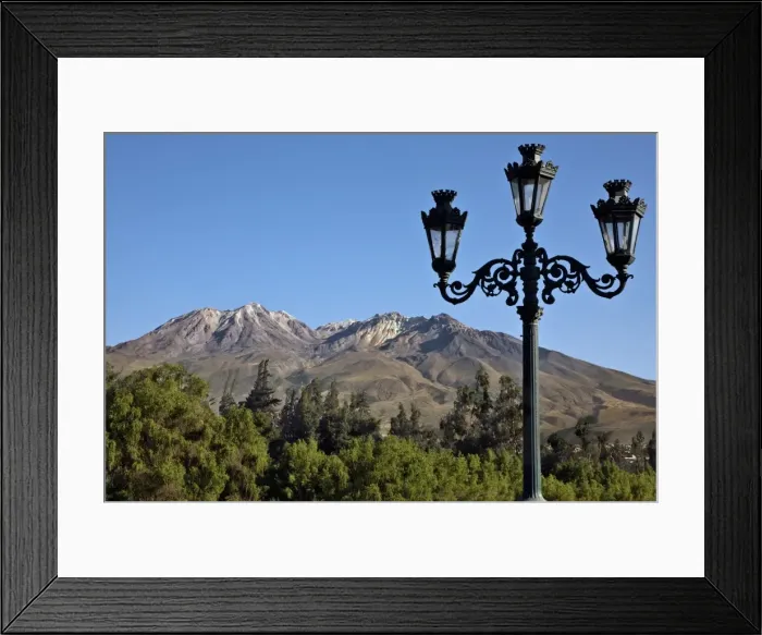 Framed Print : Peru, The extinct volcano, Chachani dominates the Arequipa skyline. Many buildings are built with sillar, stone mined from Framed Print : Peru, The extinct volcano, Chachani dominates the Arequipa skyline. Many buildings are built with sillar, stone mined from
