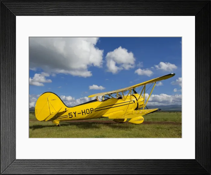 Framed Print : Kenya, Laikipia, Lewa Downs. Will Craigs 1930s style Waco Classic open cockpit bi-plane for the ultimate Framed Print : Kenya, Laikipia, Lewa Downs. Will Craigs 1930s style Waco Classic open cockpit bi-plane for the ultimate