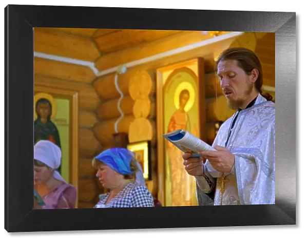 Russia, Sakhalin; An orthodox ceremony in a small church in the suburbs of Yuzhno-Sakhalinsk