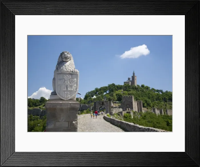 Framed Print : Bulgaria, Veliko Tarnovo. A statue of a lion guards the road to the the Tsarevets Castle Framed Print : Bulgaria, Veliko Tarnovo. A statue of a lion guards the road to the the Tsarevets Castle