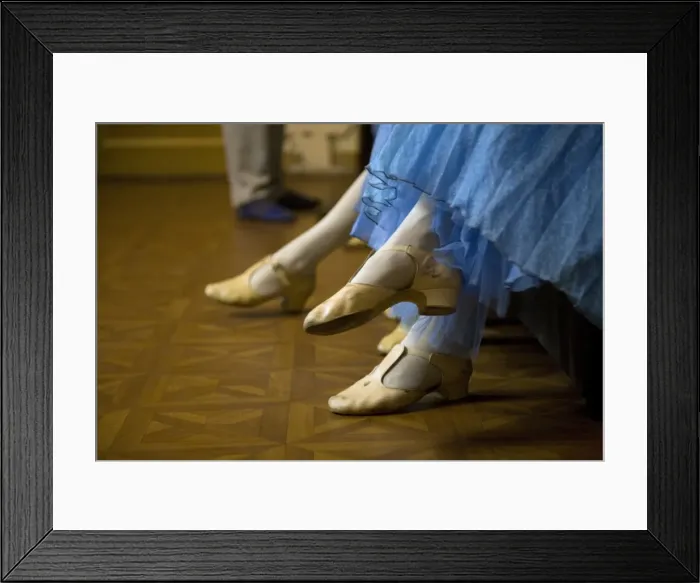 Framed Print : St. Petersburg, Russia; Detail of ballerinas shoes and dress during a short rest backstage during the perfromance of Tchaikovskys ballet Framed Print : St. Petersburg, Russia; Detail of ballerinas shoes and dress during a short rest backstage during the perfromance of Tchaikovskys ballet