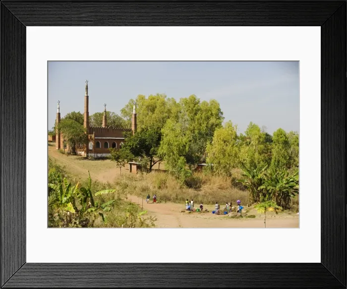 Framed Print : Malawi. Women draw water from a well in front of a mosque in central Malawi Framed Print : Malawi. Women draw water from a well in front of a mosque in central Malawi