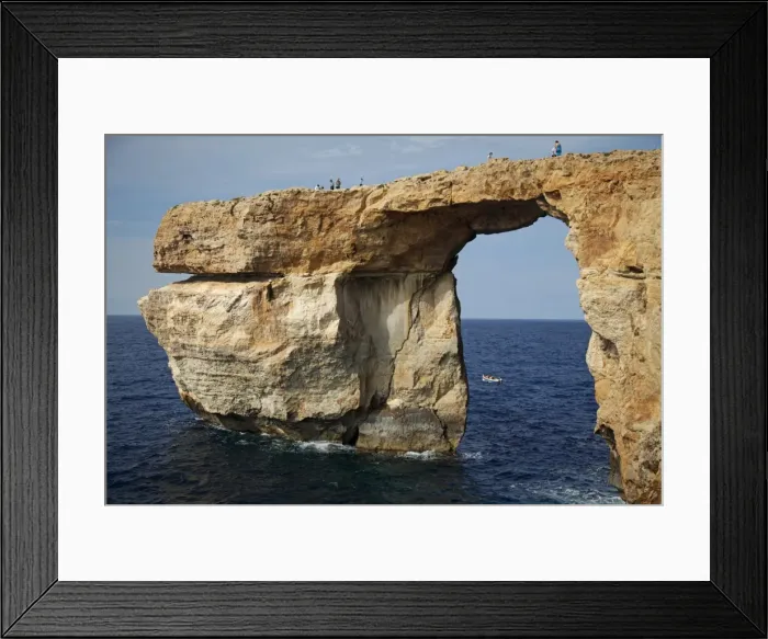 Framed Print : Gozo, Malta, Europe; A natural arch formed in rock called the Azure Window found in Dwejra, which served as the backdrop to some Hollywood blockbuster and international