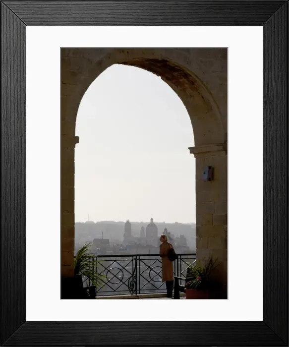 Framed Print : Malta, Europe; A tourist enjoying the scenery of the three cities from the Upper Barracca Gardens in Framed Print : Malta, Europe; A tourist enjoying the scenery of the three cities from the Upper Barracca Gardens in