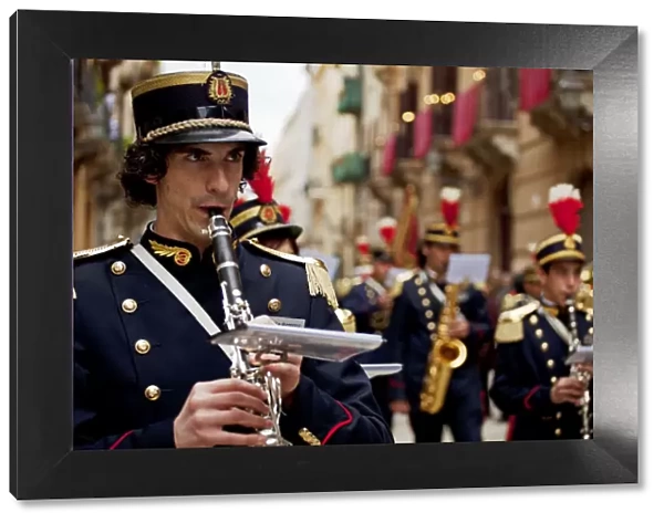 Sicily, Italy, Western Europe; A clarinettist, of the band members, during the Misteri procession