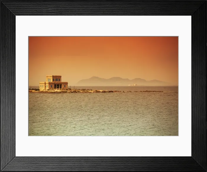Framed Print : Sicily, Italy, Western Europe; A villa at sea with the Egadi islands visible in the background in the farthest part of Framed Print : Sicily, Italy, Western Europe; A villa at sea with the Egadi islands visible in the background in the farthest part of
