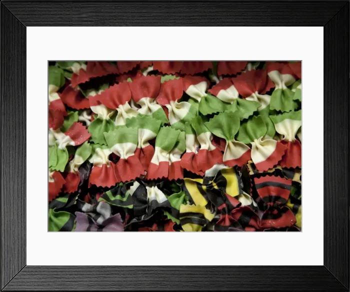 Framed Print : Venice, Veneto, Italy; Coloured pasta on display in a shop window Framed Print : Venice, Veneto, Italy; Coloured pasta on display in a shop window