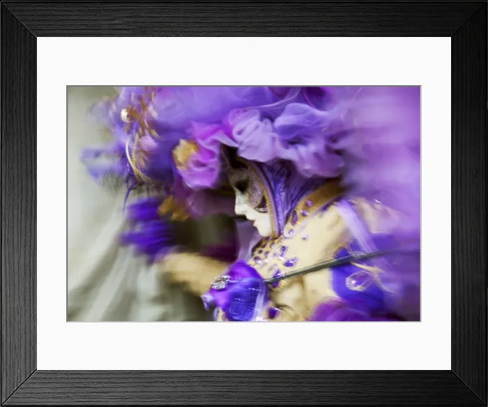 Framed Print : Venice, Veneto, Italy; A mask in movement on Piazza San Marco during Carnival Framed Print : Venice, Veneto, Italy; A mask in movement on Piazza San Marco during Carnival