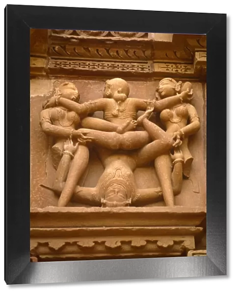 India, Madhya Pradesh, Khajuraho. The Kandariya Mahadeva Temple at Khajuraho is one of several celebrated Hindu temples famed their exuberant sculpture, some of it erotic. Khajurahos temples are now a UNESCO World