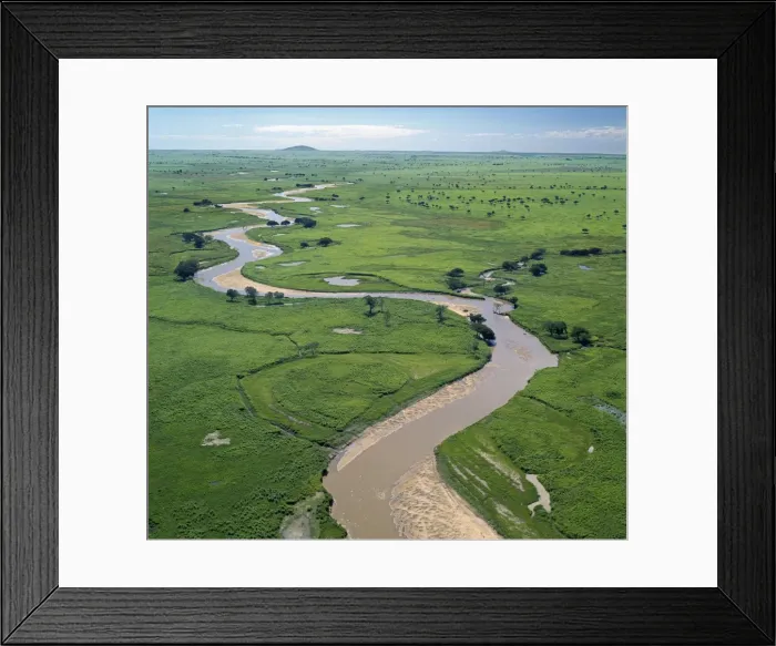 Framed Print : The Garamba River winds it way through the grasslands of the Garamba National Park in Northern Congo Framed Print : The Garamba River winds it way through the grasslands of the Garamba National Park in Northern Congo