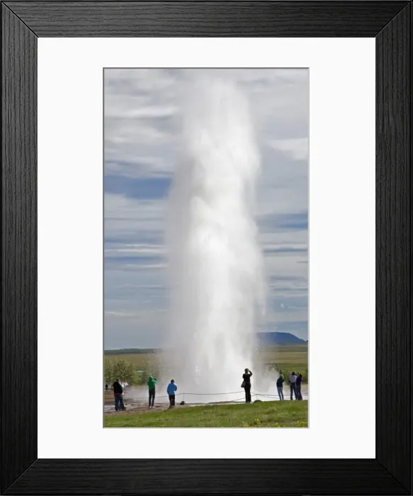 Framed Print : Visitors watching the famous Strokkur geyser which erupts every 8 to 10 minutes, thrusting hot water and steam 25 to 35 metres into the air. Only Yellowstones Old Faithful is larger albeit with less frequent activity Framed Print : Visitors watching the famous Strokkur geyser which erupts every 8 to 10 minutes, thrusting hot water and steam 25 to 35 metres into the air. Only Yellowstones Old Faithful is larger albeit with less frequent activity