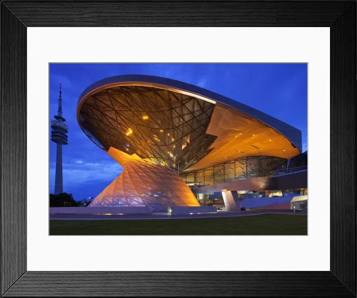 Framed Print : Twilight view of the main entrance to BMW Welt (BMW World), a multi-functional customer experience Framed Print : Twilight view of the main entrance to BMW Welt (BMW World), a multi-functional customer experience