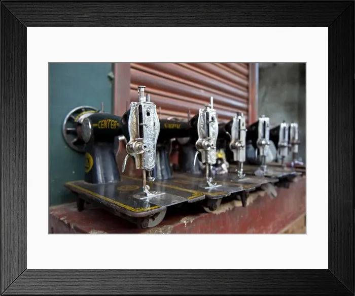 Framed Print : India, Mysore. Recently-repaired sewing machines lined up outside a sewing-machine repair shop in Mysore Framed Print : India, Mysore. Recently-repaired sewing machines lined up outside a sewing-machine repair shop in Mysore