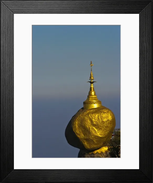 Framed Print : Myanmar, Burma, Golden Rock, Kyaiktiyo. The Golden Rock boulder balanced precariously on the edge of Framed Print : Myanmar, Burma, Golden Rock, Kyaiktiyo. The Golden Rock boulder balanced precariously on the edge of
