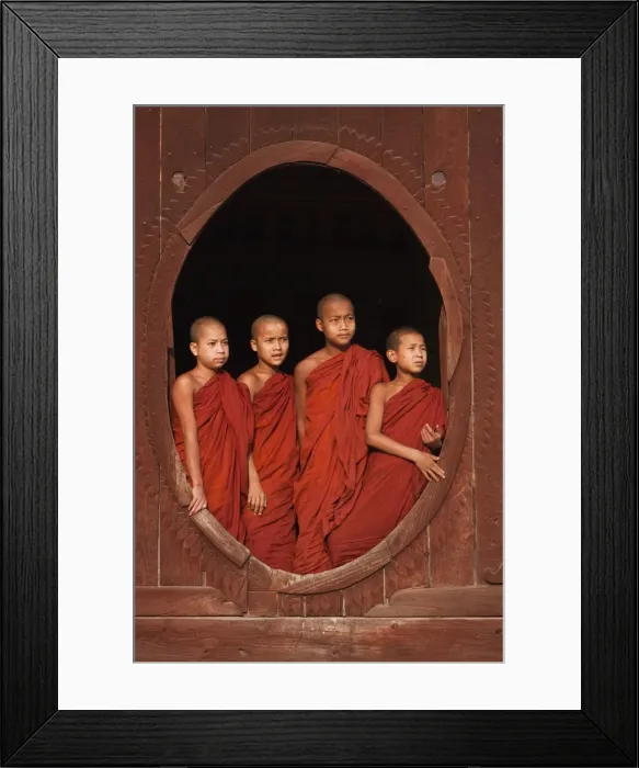 Framed Print : Myanmar, Burma, Nyaungshwe. Young novice monks standing at a wooden oval window Framed Print : Myanmar, Burma, Nyaungshwe. Young novice monks standing at a wooden oval window