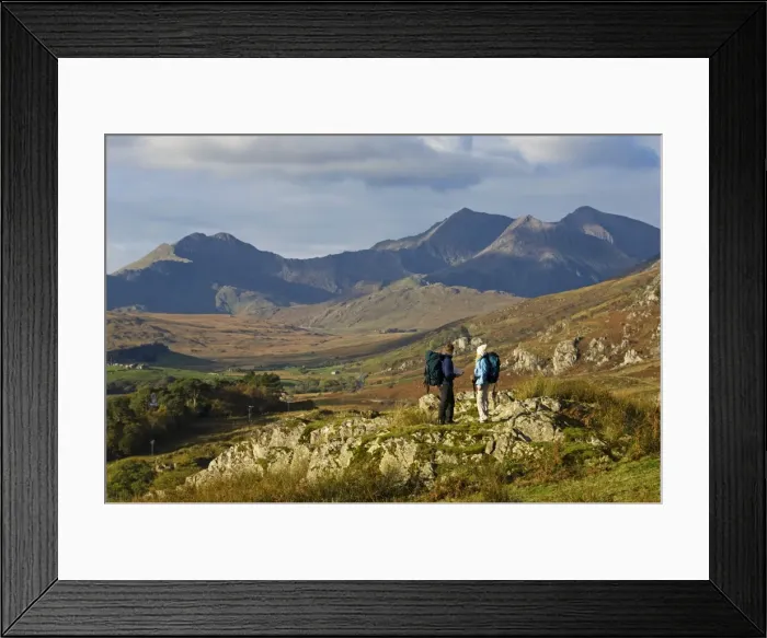 Framed Print : North Wales, Snowdonia. A man and woman stop to look at their map whilst hiking in Snowdonia Framed Print : North Wales, Snowdonia. A man and woman stop to look at their map whilst hiking in Snowdonia