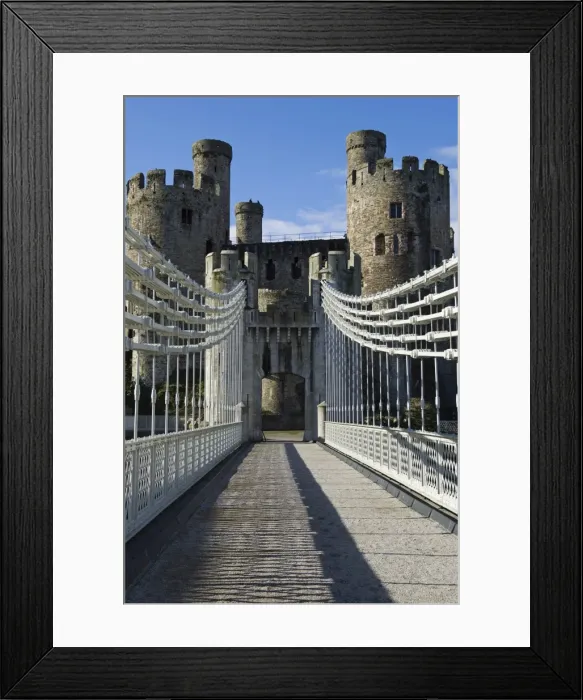 Framed Print : UK, North Wales; Conwy. The elegant Suspension Bridge built by Thomas Telford across the Conwy River to the imposing Framed Print : UK, North Wales; Conwy. The elegant Suspension Bridge built by Thomas Telford across the Conwy River to the imposing