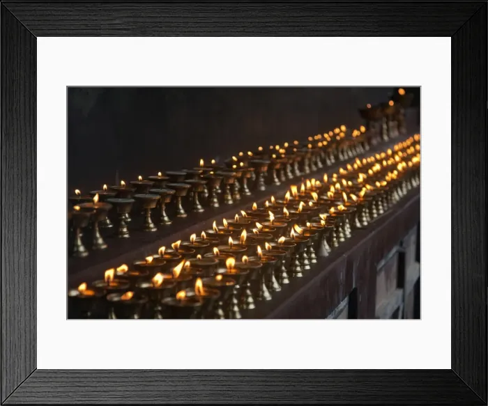 Framed Print : A long line of butter lamps burning at the Changangkha Temple, a fine 15th century temple Framed Print : A long line of butter lamps burning at the Changangkha Temple, a fine 15th century temple