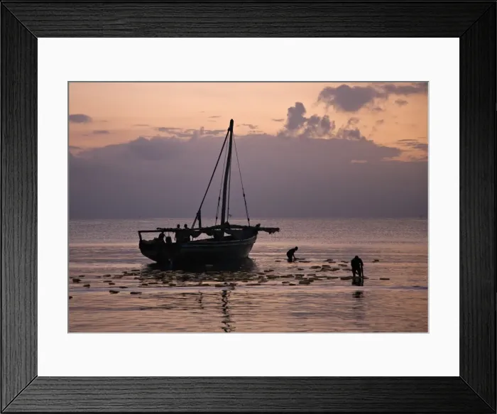 Framed Print : Off-loading a cargo of edible oil from a dhow from Zanzibar at dawn Framed Print : Off-loading a cargo of edible oil from a dhow from Zanzibar at dawn