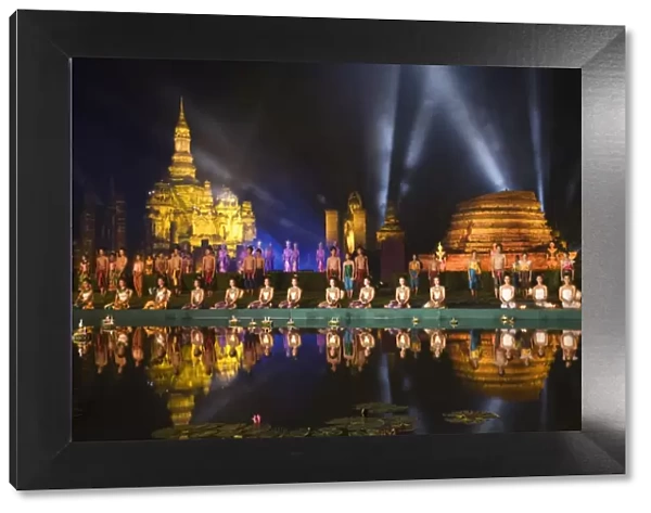 Thailand, Sukhothai, Sukhothai. Sound and Light Show at Wat Mahathat in the Sukhothai Historical Park. The show is part of the Loy Krathong festival held in November, featuring cultural performances, parades and the floating of lotus shaped