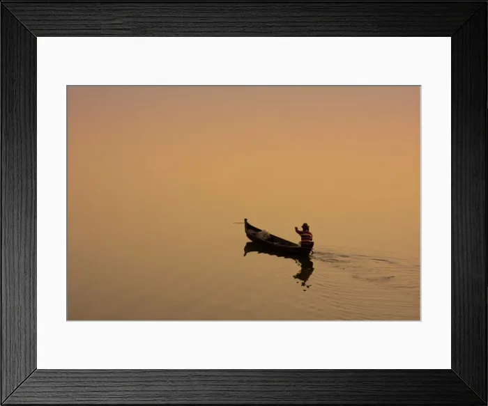 Framed Print : Myanmar, Burma, Amarapura. A fisherman paddling across Taungthaman Lake at sunrise Framed Print : Myanmar, Burma, Amarapura. A fisherman paddling across Taungthaman Lake at sunrise