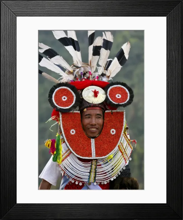 Framed Print : Myanmar, Burma, Naga Hills. A Tangkhul Naga in his ceremonial finery celebrating the Naga New Year Festival (Kaing Bi) in Framed Print : Myanmar, Burma, Naga Hills. A Tangkhul Naga in his ceremonial finery celebrating the Naga New Year Festival (Kaing Bi) in