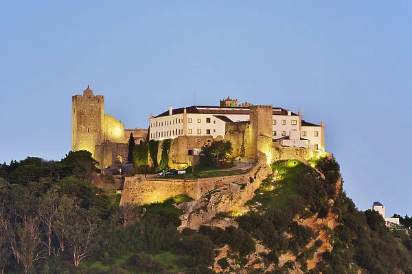The 12th century castle of Palmela and the Pousada (Hotel) at twilight