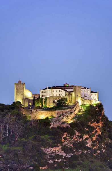 The 12th century castle of Palmela and the Pousada (Hotel) at twilight