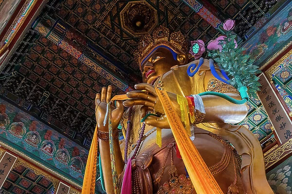 18m-high statue of the Maitreya Buddha in Wanfu Pavilion at Yonghe (or Lama) Temple, Beijing, China