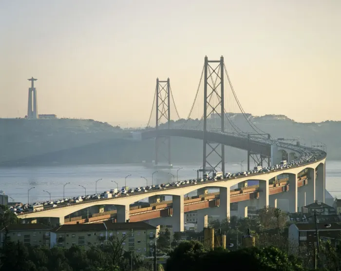 Framed Print : The 25th of April bridge on a big traffic day and the huge statue of Cristo Rei, Lisbon Framed Print : The 25th of April bridge on a big traffic day and the huge statue of Cristo Rei, Lisbon