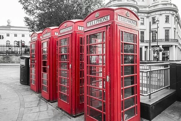 4 red telephone boxes, London, England, UK