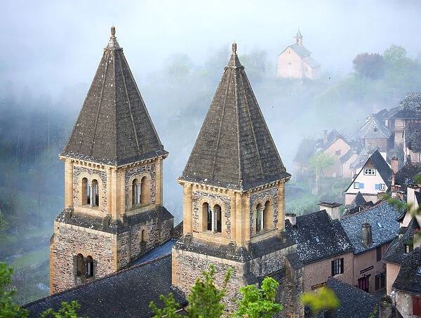 Abbey church of Saint Foy in morning mist, Conques, Aveyron, Languedoc-Roussillon