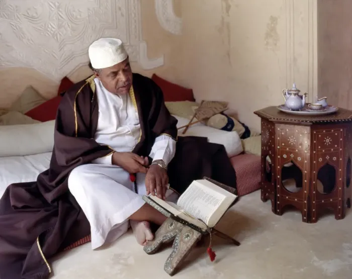Framed Print : Abdul Malik Bilali recites the Holy Koran in his beautiful Framed Print : Abdul Malik Bilali recites the Holy Koran in his beautiful