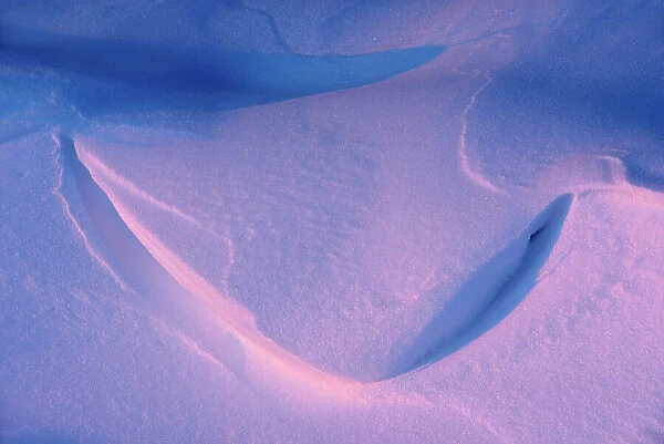 Abstract pattern of wind blown snow at sunset Birds Hill Provincial Park, Manitoba, Canada