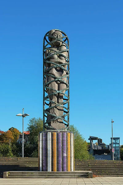 Adam und Eva sculpture made by Bjorn Norgaard against clear blue sky, Kiel, Schleswig-Holstein, Germany
