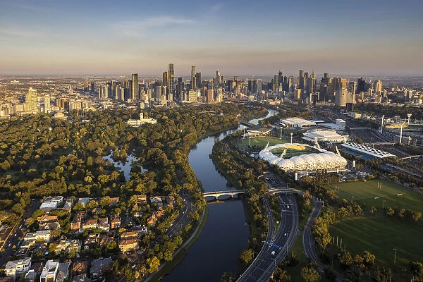 Aerial of the city, Yarra River, Royal Botanic Gardens and aMI Park stadium, Melbourne