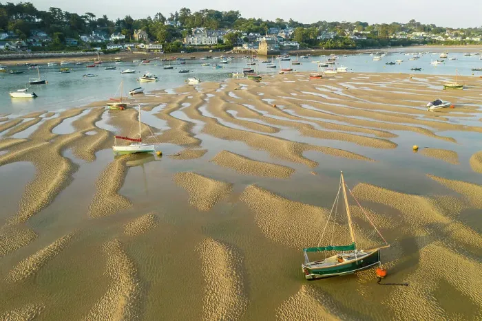 Framed Print : Aerial image of boats stranded on sand bar in the Camel Estuary near the village of Rock, Cornwall, England. Summer (August) 2022 Framed Print : Aerial image of boats stranded on sand bar in the Camel Estuary near the village of Rock, Cornwall, England. Summer (August) 2022