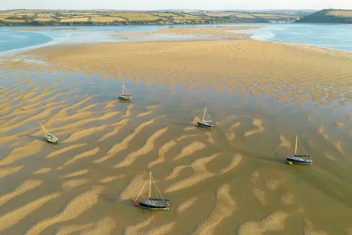 Framed Print : Aerial image of boats stranded on sand bars in the Camel Estuary, Rock, Cornwall, England. Summer (August) 2022 Framed Print : Aerial image of boats stranded on sand bars in the Camel Estuary, Rock, Cornwall, England. Summer (August) 2022