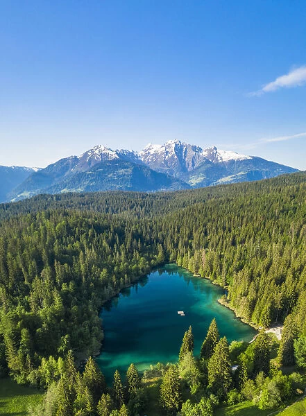 Aerial panoramic of Cresta lake (Crestasee) and woods, Flims, canton of Graubunden