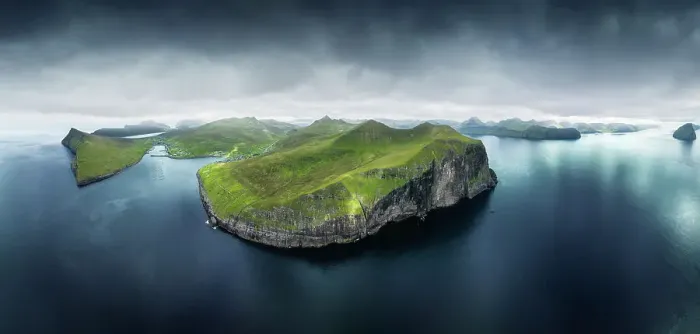 Framed Print : Aerial panoramic view of the islands of Vagar and Eysturoy during a gloomy cloudy day. Faroe Islands Framed Print : Aerial panoramic view of the islands of Vagar and Eysturoy during a gloomy cloudy day. Faroe Islands