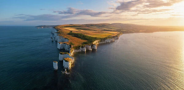 Aerial and panoramic view of Old Harry Rocks at sunset during summer, Handfast Point, Purbeck isle, Dorset, England, United Kingdom