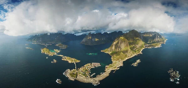 An aerial panoramic view of the whole Reine fjord on a windy afternoon. Lofoten Islands, Norway