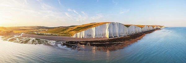 Aerial and panoramic view of Seven Sisters and Cuckmere Haven beach during sunset, Sussex, England, United Kingdom