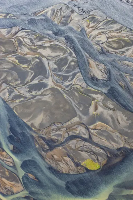 Framed Print : Aerial of river estuary water coloured by glacial melt, Iceland
