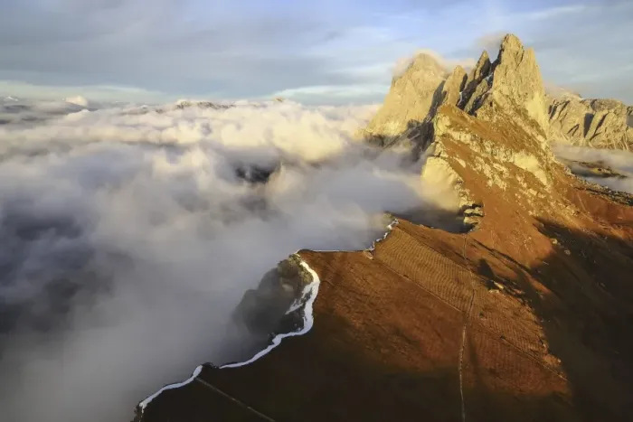 Framed Print : Aerial shot from Seceda of Odle surrounded by clouds at sunset Framed Print : Aerial shot from Seceda of Odle surrounded by clouds at sunset