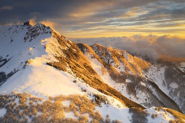 aerial sunset in winter time taken by drone of Gendarme Mountain